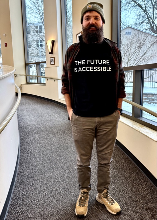 Zach Beaudoin, founder of Beau Access Solutions, wearing a shirt that reads 'The future is accessible'